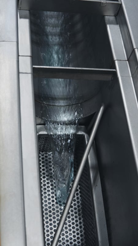Close Up Trench Drain Open with Water Flowing