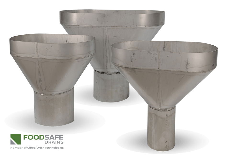 Three large hub drains with funnels are positioned near each other.