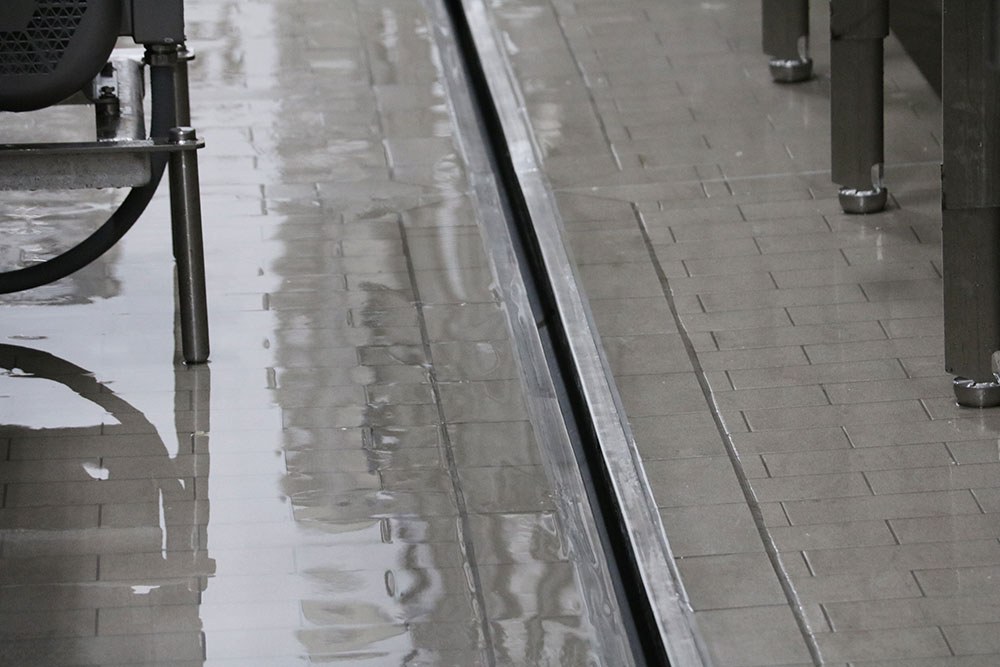 Commercial floor shop drain installation