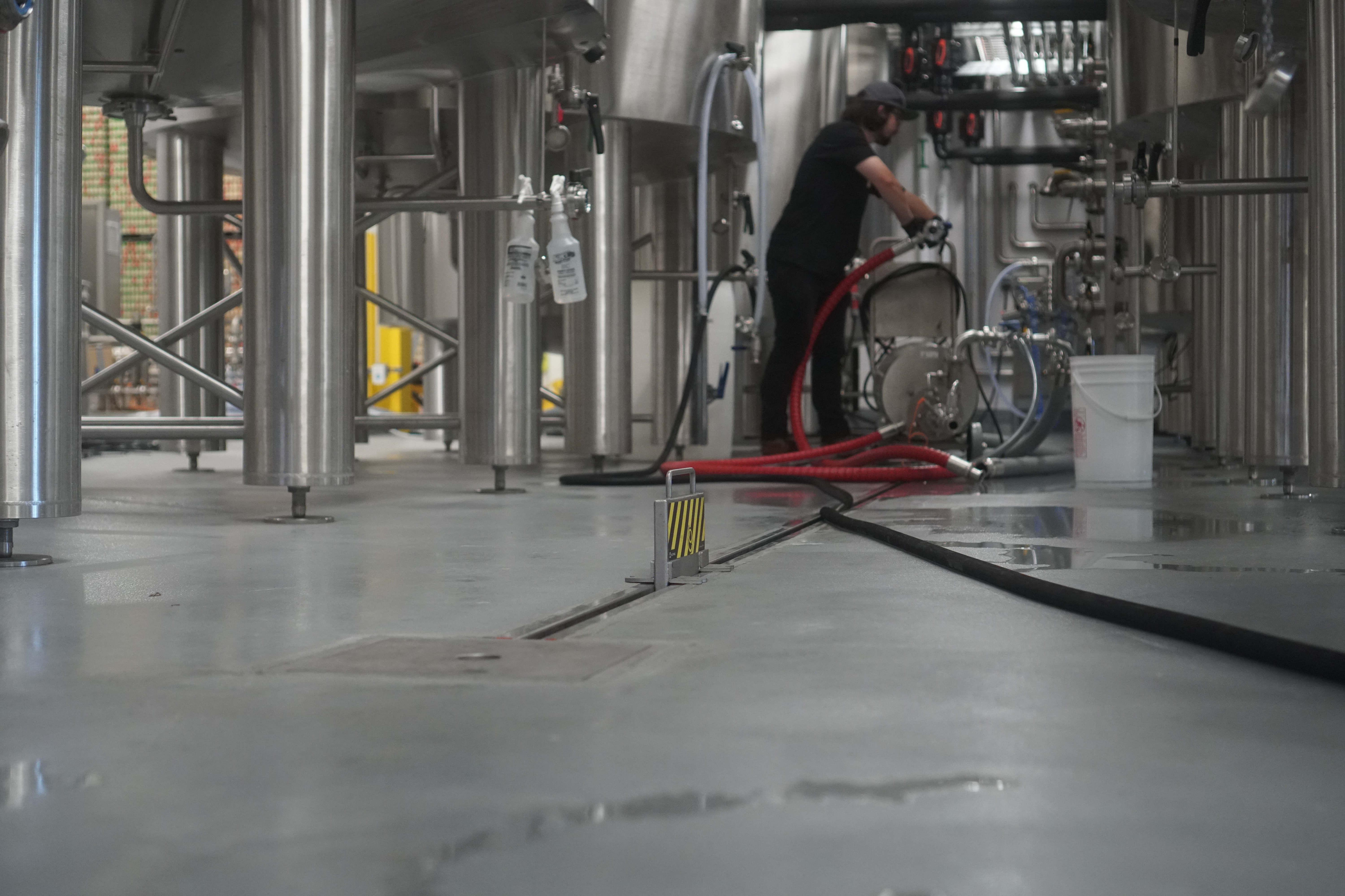 slot drain system near brew tanks for brewery drainage